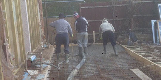 Laying concrete extension floor in Evesham